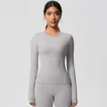 Detail view of high-elastic light grey yoga set with seamless seams and slim fit design - 7102 Long Sleeve - Frost Grey / S