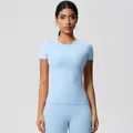 Front view of women's tight light blue yoga set with short sleeve top and leggings - 7103 Short-sleeved T-shirt - Sky Blue / S
