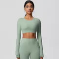 Detail of high-waist sage green yoga set with long sleeve crop top for fitness - 7104 Long Sleeve - Basil Green / S