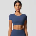Front view of blue two-piece yoga set featuring cropped short sleeve top and high waist leggings - 7105 Short-sleeved T-shirt - Badge Blue / S