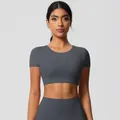 Detail of charcoal grey seamless yoga set with high-waist leggings and crop top shirt - 7105 Short-sleeved T-shirt - Graphite Gray / S