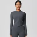 Detail of dark gray slim-fit yoga set with stand collar zipper jacket and leggings - 7106 Zipper Jacket - Graphite Gray / S
