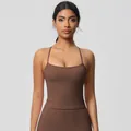 Close-up of brown high-elastic yoga tank top with thin straps and a slim fit design - S / Tank Top (7107) / Chestnut Brown