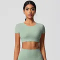 Slim-fit mint green yoga set with high-waisted leggings and short sleeve crop top - 7105 Short Sleeve - Basil Green / S
