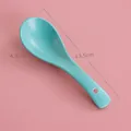 Matte cyan ceramic spoon 13.5cm length with Nordic minimalist style and small hanging hole - Teal