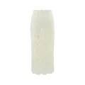 Detailed view of elegant off-white lace skirt with intricate floral crochet patterns - Apricot
