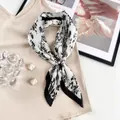 Pleated black and white floral chiffon scarf with elegant pearl magnetic buckle accessory - Black and White