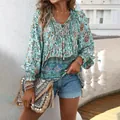 Blusa bohemia de manga larga con estampado floral, cuello en V y diseño étnico - S / Azul