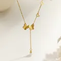 Elegant gold-tone Y-necklace with butterfly charms and a white pearl pendant - Butterfly Pearl Tassel (XKN1098)