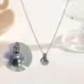 Elegant titanium steel necklace featuring a dark grey pearl pendant and fine silver chain - Zirconia Pearl (XKN0512)