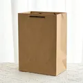 Eco-friendly brown kraft paper shopping bag with black rope handles and reinforced base - (x4 Size Vertical Black Rope) 32mm Long * 16mm Side * 41mm High; (single) Kraft Paper With Rope Threading