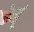 Pince à cheveux papillon en métal argenté avec strass pour coiffures chic - Papillon Ondulé en Strass