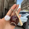 Three-piece baseball keychain set with dark brown glove, white ball and wooden bat charms - 2CM Long Bat White Ball Brown Glove