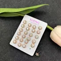 Golden flower earring set with round zircon stones on a white display card - 10-Pair Flower Set (No. 2) / 18K Gold