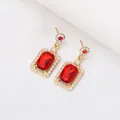 Elegant gold-plated drop earrings with rectangular red ruby stones and diamond accents - Red Stud Earrings (3089)
