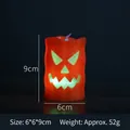 Halloween pumpkin LED candle light in orange with glowing green face 6x6x9cm - Orange Skull Colorful Lamp