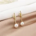 Detail of long drop earrings with gold base, sparkling crystals and lustrous pearls - Artificial Pearl Rhinestone Bar Pendant