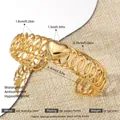 Adjustable 18K gold plated stainless steel coil bracelet with central heart charm - Gold Heart Spring Open Bangle (95) / Gold