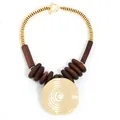 Ethnic necklace with golden round pendant and dark brown wood beads on white background - Spiral Disk Pearl Style (X-1228) / Brown