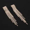 Elegant silver tassel dangle earrings with sparkling crystals for a sophisticated look - Gold Square