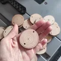 Detailed view of natural pine wood slices with bark edges and pre-drilled holes for DIY crafts - Wood Slice (Double Holes) / Diameter Under 3cm Thickness 0.5cm