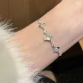 Elegant silver pearl bracelet with fan shaped moonstone charm and shimmering diamonds - Frost Ginkgo Leaf Silver Bracelet
