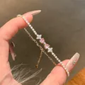 Adjustable gold tennis bracelet with pink heart bow and crystal flowers for women - Floral Pink Diamond Bowknot Bracelet