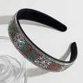 Christmas headband with red and green beads on a black velvet base for holiday styling - Beaded Green Snowflake
