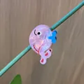 Pink marble textured whale hair claw clip with blue bow and acetate material - Pink Small Dolphin