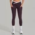 Legging de yoga prune avec taille croisée blanche et poches latérales pratiques - Pourpre Parfum