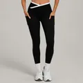 High-waisted black yoga leggings featuring white V-cross waistband and side pockets - S / Black