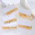 Golden earring set with pearls and geometric chains on a fashion jewelry card - Gold Pearl Hoop Combination Style (6675601HB)