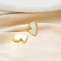 Elegant gold heart earrings with white mother of pearl inlay on luxury silk fabric - Irregular Broken Heart Mother of Pearl Style (E271-2) / Main Image Color