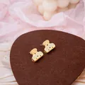 Elegant gold hollow dot stud earrings on a dark textured background display - Gold Semi-Cylindrical Hollow Dot Stud Earrings (E4813-1) / Gold
