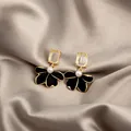 Vintage style drop earrings with yellow crystal, white pearl and black floral charm - Gold Gem Black Enamel Flower Artificial Pearl Drop Earrings (E4926-2) / Black