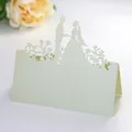 Detail view of laser-cut wedding table card featuring bride and groom silhouette - 10*10CM / Emerald Green