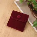 Elegant burgundy velvet jewelry pouch with snap button closure on a wooden surface - Silk Velvet Snap Bag / 7*7cm / Burgundy