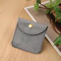 Elegant grey velvet jewelry pouch with golden snap button on light wood background - Lis Velvet Snap Bag / 8*8cm / Gray