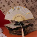 Vintage Chinese silk folding fan with golden embroidery and elegant champagne tassel - 2026 Hot Selling Item - Suzhou Embroidery Fan - Osmanthus Rabbit
