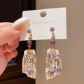 Detailed macro view of purple crystal tassel earrings with S925 silver posts. - 26# Silver Earring Post-Gold-Purple