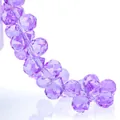 Macro view of faceted lavender purple K9 crystal teardrop beads for jewelry making - 8mm (Approx 87 beads/strand) / Natural Crystal Purple