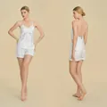 Elegant white satin pajama set with lace trim and open back cross straps design - XS / White