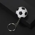 Klassischer schwarz-weißer Fußball-Schlüsselanhänger mit strukturierter Oberfläche und Kette - Schwarz & Weiß / 3,6 cm