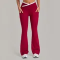 Women's burgundy yoga flare pants featuring white cross high waist and side pockets - Retro Copper