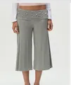 Detail of high-waist grey culottes featuring decorative metal studs on the waistband - S / Grey Studded