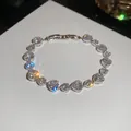 Elegant silver heart-shaped zircon bracelet with sparkling starburst effects - Heart / Silver