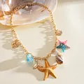 Collier thème océan avec breloques étoile de mer et conque en résine sur chaîne dorée - Style Pendentif Conque / Or-Multicolore