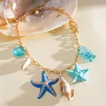Détail du collier de vacances d'été avec étoile de mer en résine et coquillages. - Style Pendentif Étoile de Mer / Or-Bleu