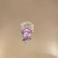 Close-up detail of a sweet purple flower beaded ring with clear crystal beads on mirror - Purple Flower Style (HR3453) / Purple