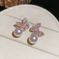 Nahaufnahme von 18 Karat vergoldeten Schmetterlingsohrringen mit Zirkon - Vergoldeter Schmetterlings-Kunstperlen-Stil (30#) / Gold Rosa
